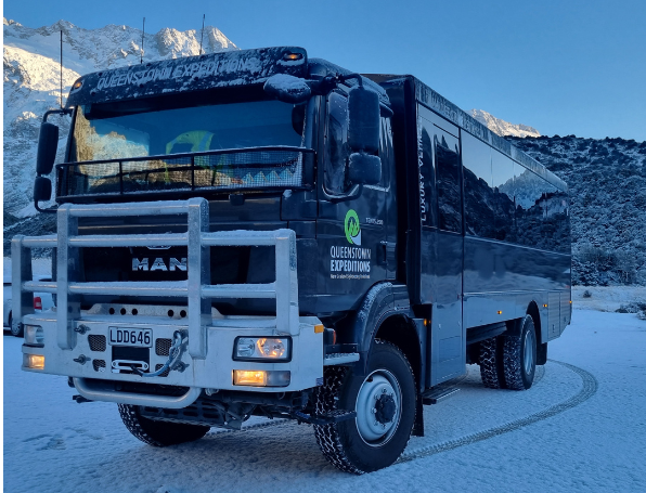 Queenstown Expeditions vehicle with snow on the ground