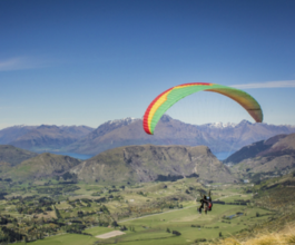 A paraglider taking off at Coronet Peak