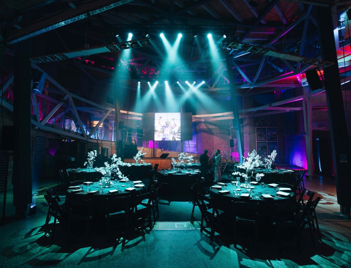 AJ Hackett Kawarau Bungy Centre set up for an event with round tables and stage.