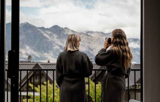 A couple taking in the views from Kamana Lake House